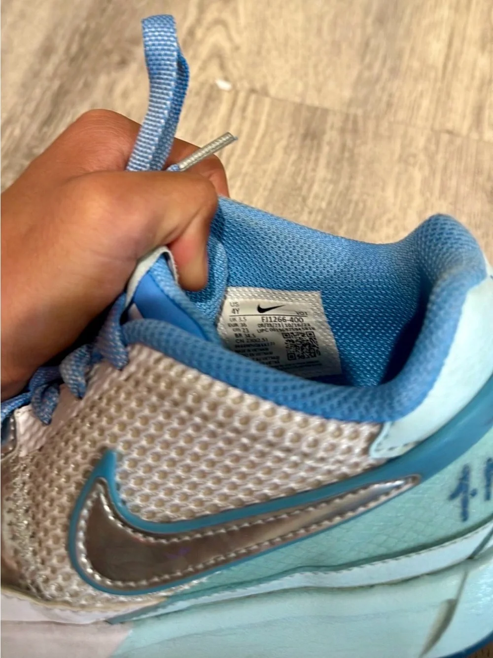 Nike White & Blue Athletic Sneakers with Iridescent Detail